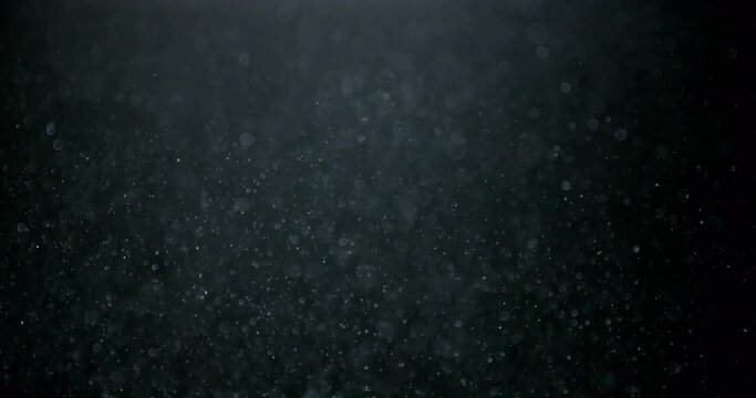 3D rendering and generated many micro bubble spheres randomly floating in the air. Close up and slow-motion movement.