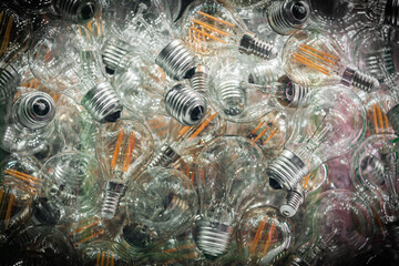 Light bulbs Incandescent vignette background , lighting , many, background texture glass , flatlay...