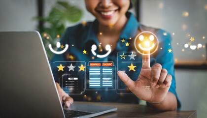 touching the virtual screen on the happy smiley face icon to give satisfaction in service. Rating very impressed. Customer service, testimonial satisfaction concep - obrazy, fototapety, plakaty