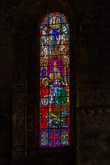 A very detailed stained glass inside a church