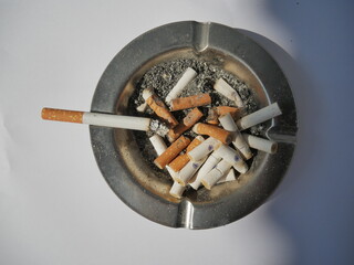 cigarette and ashtray photo
