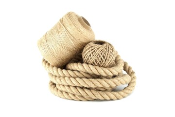 Thick strong jute rope and twine spools on white