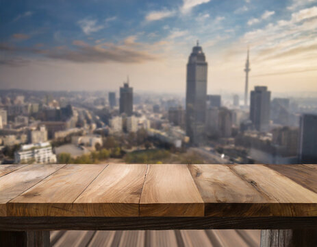 Wood table top on blur cityscape background - can be used for display or montage your products. High quality photo
