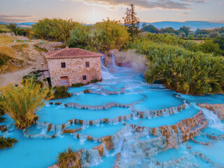 Toscane Italy, natural spa with waterfalls and hot springs at Sa - obrazy, fototapety, plakaty