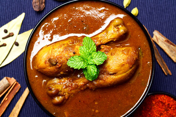 Spicy chicken curry in bowl, chicken masala
