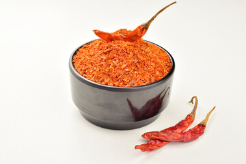 Red chilli powder isolated on white background