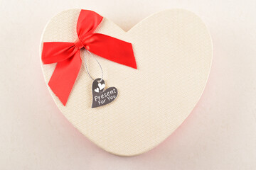 Top view of heart shape gift box on white background