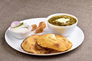 Saag with corn chapati served with jaggery, punjabi healthy dish