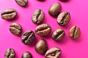 Closeup of coffee beans on purple background