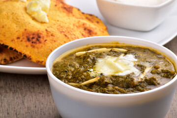 Closeup of saag with roti, healthy punjabi food