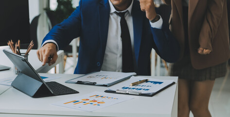 Team of business people working together in the meeting room office, teamwork background charts and graphs banner, double exposure successful teamwork,business planning concept.