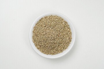 Top view of ajwain on white background, healthy indian seeds