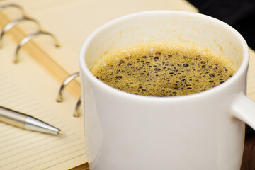 Closeup of black coffee at table