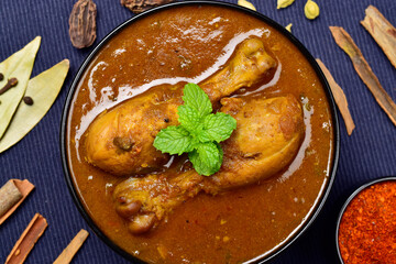 Top view of spicy chicken curry in bowl