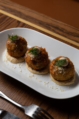 Three arancini balls.