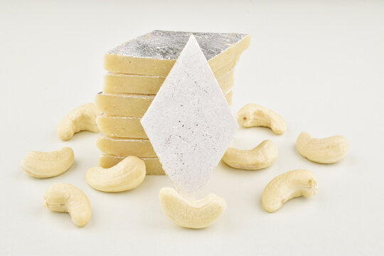 Closeup of kaju katli on white background, famous indian sweet