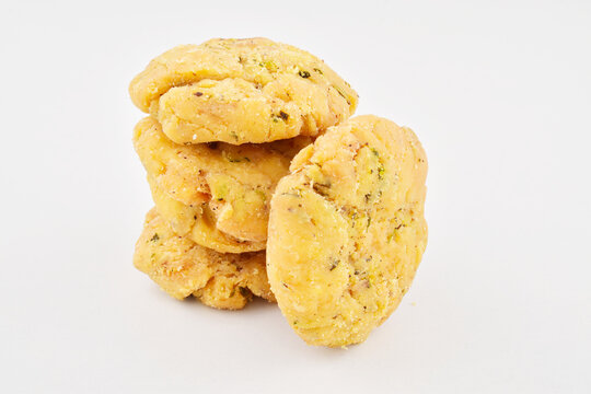 Indian snacks mathri isolated on white background