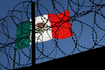 Barbed wire and flag of Mexico