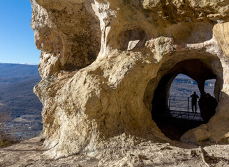 Mountainous terrain, stone labyrinths, caves and grottoes.Travel autumn sunny day.