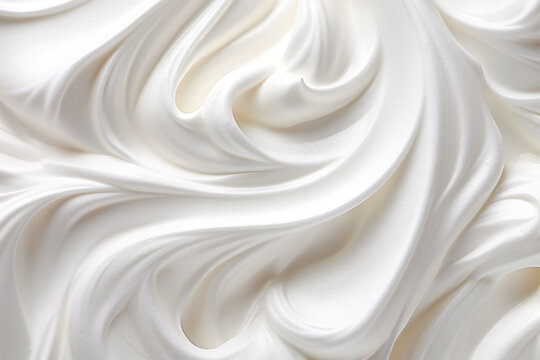 Close up of white whipped cream swirl texture for background and design.