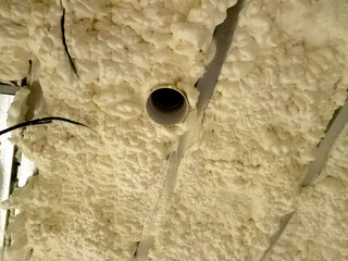 installation of polyurethane foam insulation with compressed gas goes through pipe through gun straight to the structure, it sticks like mush and swells like sponge. every crevice sealed, man, pipe 