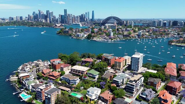 Drone aerial beautiful Sydney harbour CBD scenery city skyline Harbour Bridge Opera house residential unit apartments North Sydney Cremorne Neutral Bay Kirribilli NSW Australia travel tourism 4K