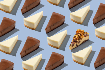 Vanila and chocolate piece slice cheesecake pattern on blue background isolated