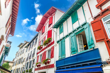 Colorful facades typical of Basque country buildings in the center of Saint-Jean-de-Luz, France