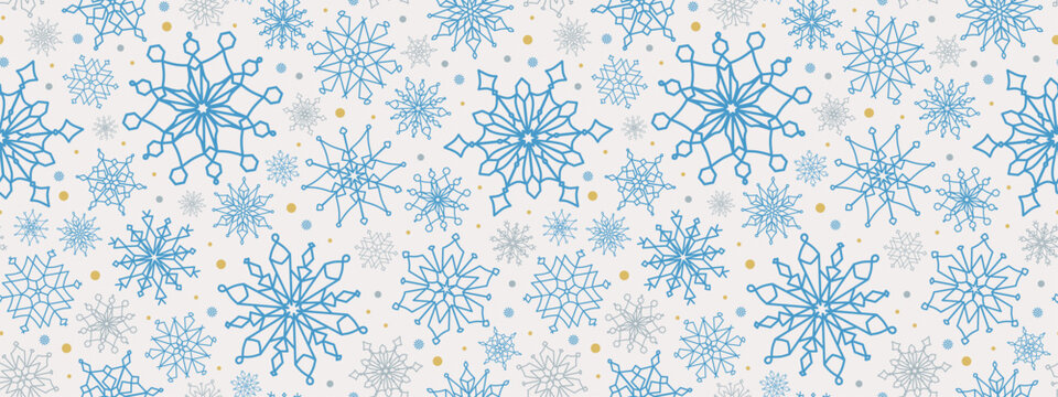 Seamless pattern with blue snowflakes on a light background