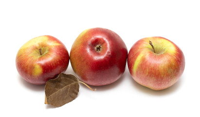 Red apples on a white background. Photo.