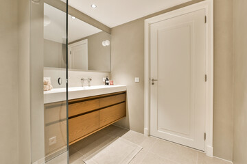 a bathroom that is very clean and ready to use as a shower stall or room divider for the toilet