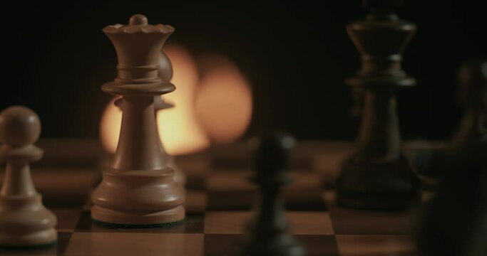 A chess game set in a fireplace atmosphere