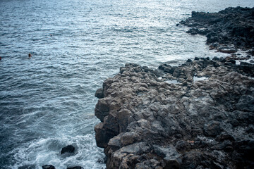 Stone coast of Tenerife, ocean, waves in Tenerife, stone beaches of Tenerife