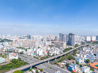 Fototapeta na wymiar Aerial view of Ho Chi Minh City skyline and skyscrapers in center of heart business at Ho Chi Minh City downtown.