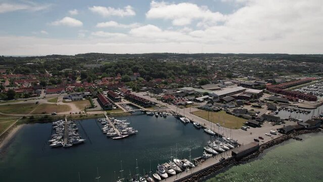 Truck Shot of Marina in Idyllic Surroundings, Docked Sail Boats, Yachts and Motorboats