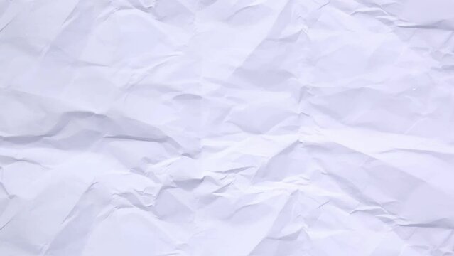 Crumpled white paper sheet seamless texture, copy space, motion graphic. background animation white crumpled paper stop motion.