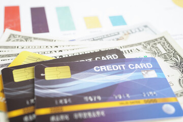 Credit card with password key lock and US dollar banknote money, security finance business concept.