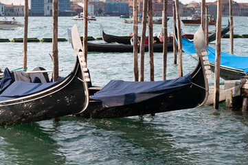 Canal with gondolas in Venice, Italy. Architecture and landmarks of Venice. Postcard with gondola.