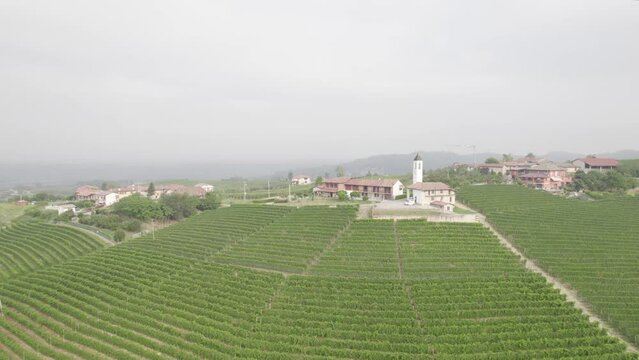 Aerial View Of Chiesa della Nativita di Maria Vergine Surrounded By Vineyards In Bergera, Italy.