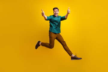 Fototapeta na wymiar Photo of cheerful nice man dressed trendy outfit run hurry black friday sale recommend cool product isolated on yellow color background