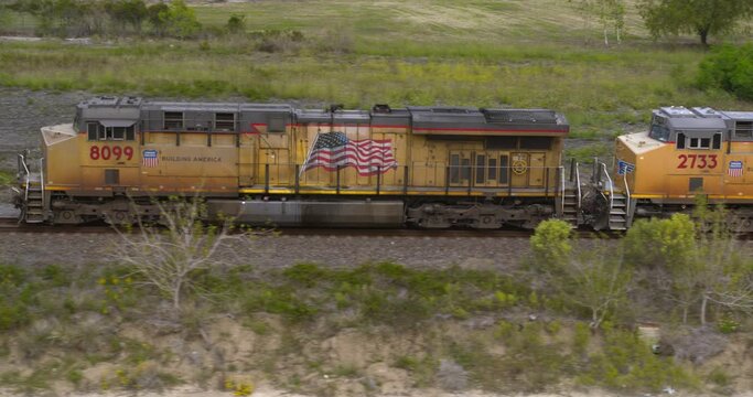 Side view of train on traveling on train tracks