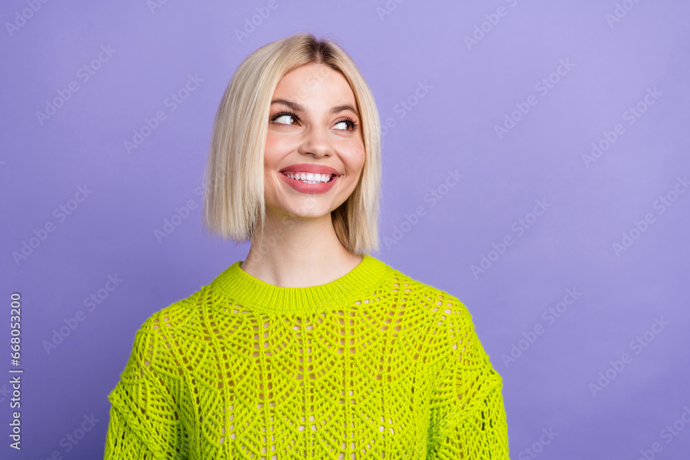 Sticker Photo of good mood dreamy woman dressed knitted sweater looking empty space isolated violet color background