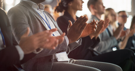 Close Up on Hands of Audience of People Applauding in Concert Hall During Business Forum Presentation. Technology Summit Auditorium Room With Corporate Delegates. Excited Entrepreneurs Clapping. - obrazy, fototapety, plakaty