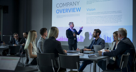 Corporate Event: Caucasian Male Tech CEO Giving Presentation To Colleagues, Investors In Conference...