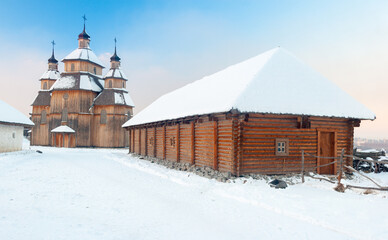 Wooden house and church on 