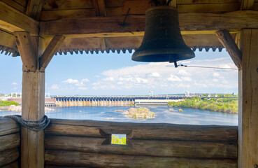 View of Dniproges dam and Dnieper river from wooden bell tower on Zaporozka Sich cossacks fortress,...
