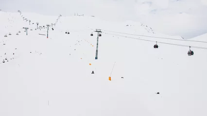 Fotobehang Gondolas in the ski resort aerial view © george