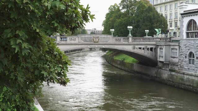 Dragon bridge, an old stone bridge spanning the Ljubljanica river in central Ljubljana, Slovenia