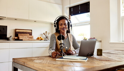 Smiling woman doing a podcast