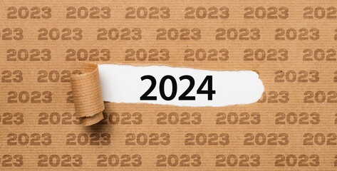 Torn paper revealing the number 2024